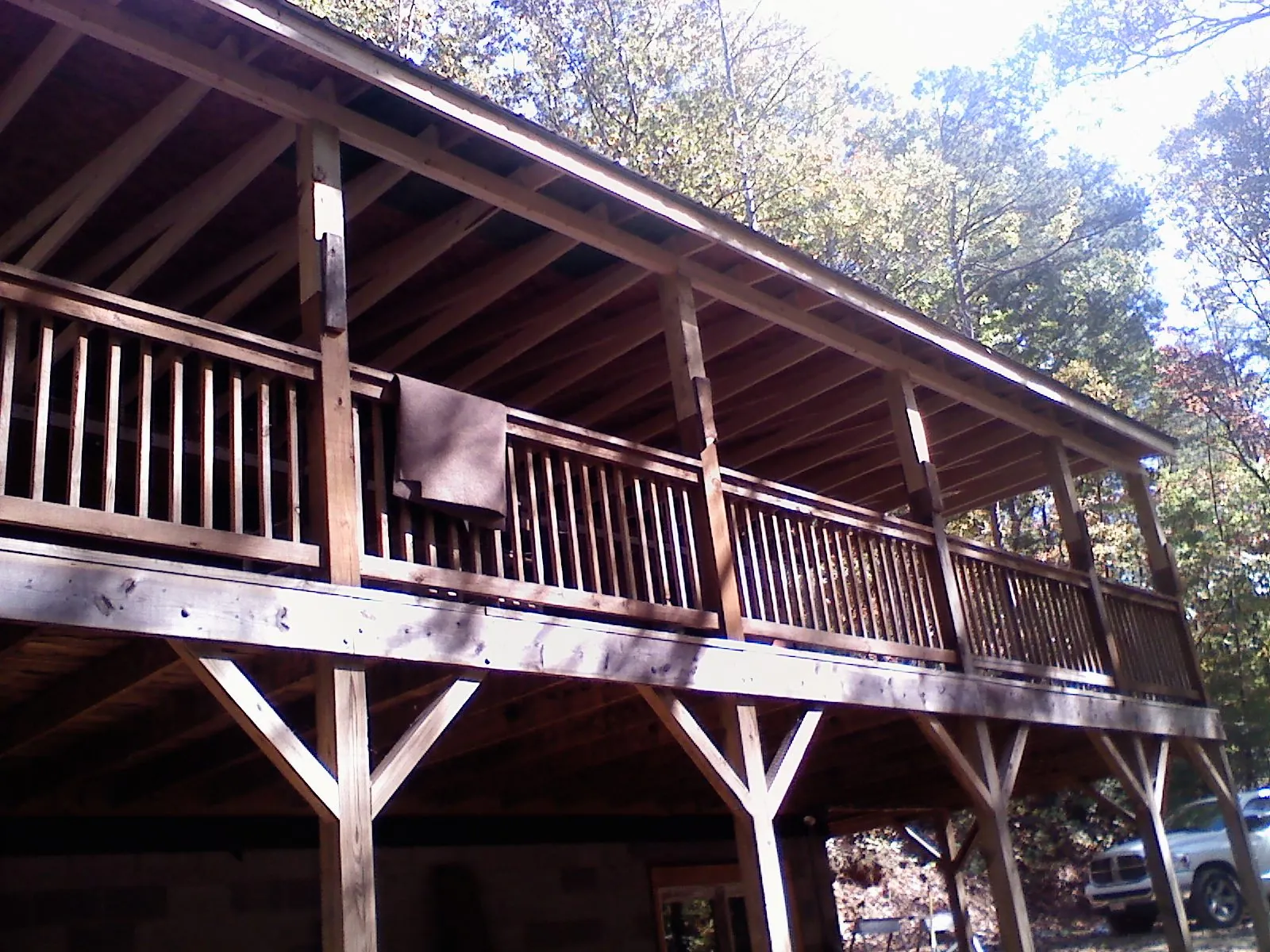 Timber framing under a new elevated porch and deck — Roof Leak Repair in Helotes by Roofing Brothers